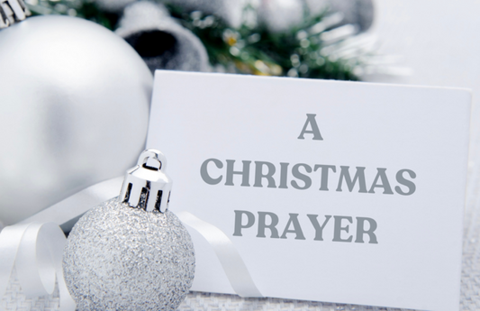 A Christmas Prayer With Card And White Ornaments
