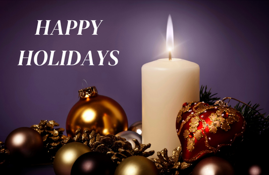 Happy Holidays With One Lit White Candle And Ornaments