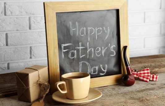Happy Father’s Day With Gift, Coffee Cup, Pipe And A Bow Tie.