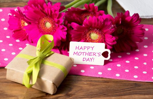 Happy Mother’s Day Tag With Flowers And A Gift On Wrapping Paper