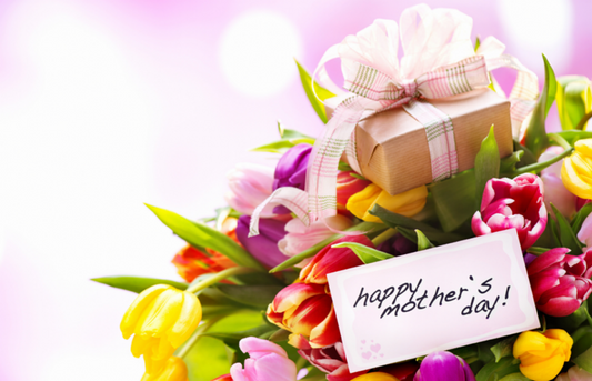 Happy Mother’s Day With Multicolored Tulips And A Small Gift