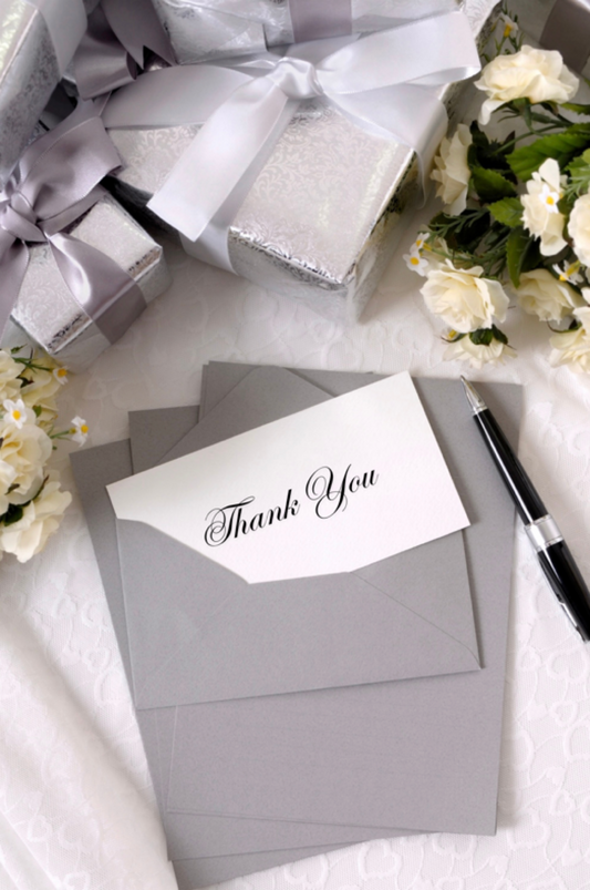 Thank You With Card, Pen, Flowers And Gifts